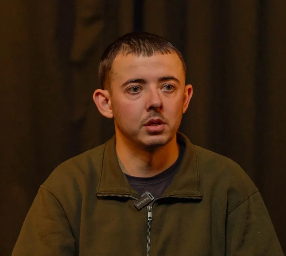 Ukrainian captive stripped, placed next to corpse, threatened by Russian forces