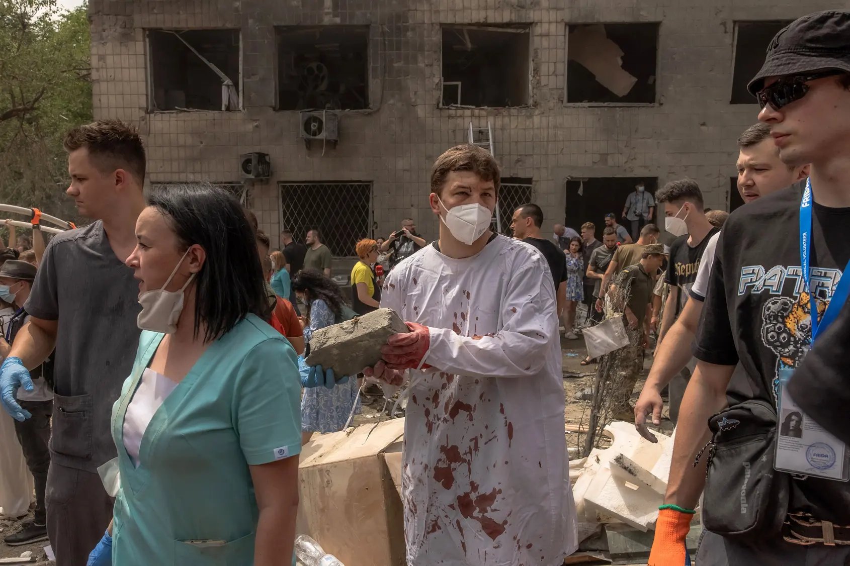 Volunteers clear rubble at Kyiv children’s hospital after Russian attack