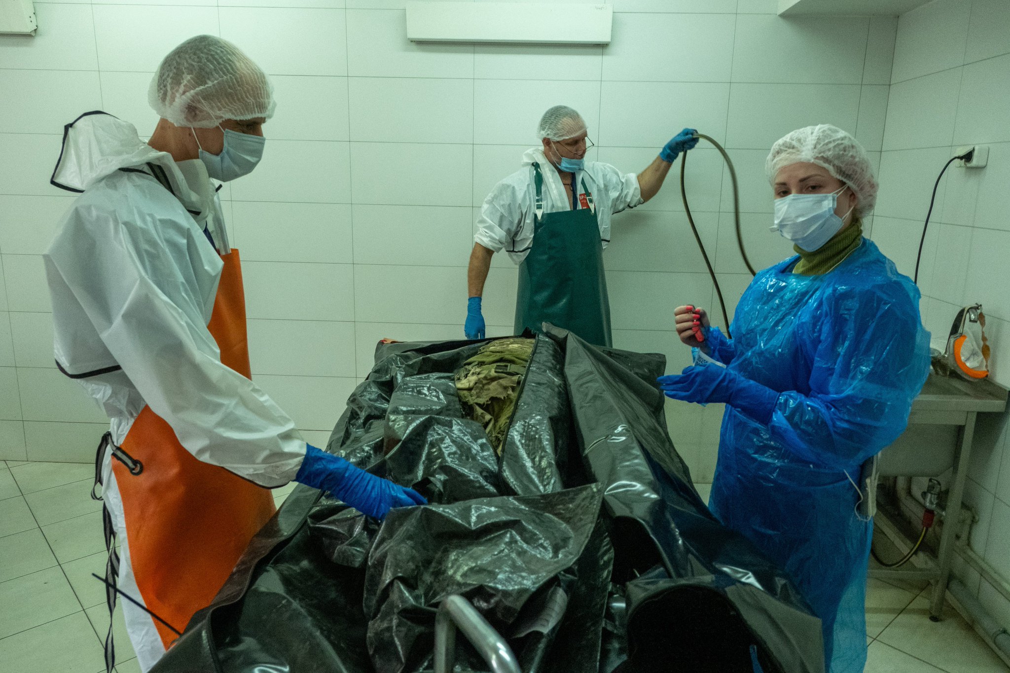 Trucks bring Russia’s killed to Dnipro morgue daily