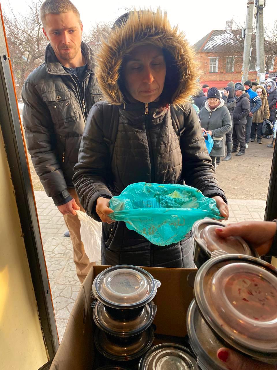 Kharkiv residents line for hot meals from World Central Kitchen partner