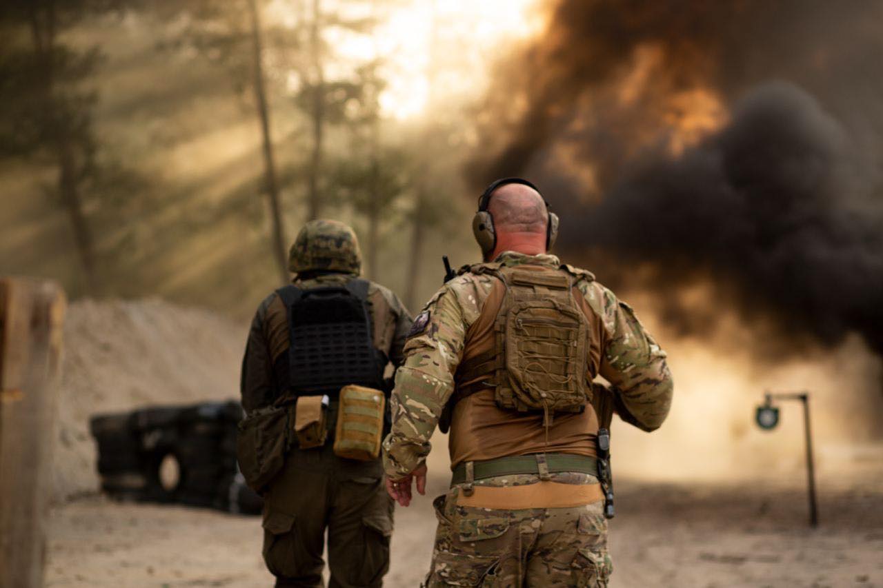 Ukrainian soldiers training for the front line, emphasizing unity