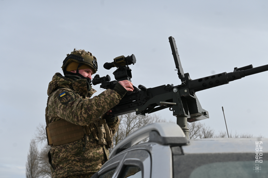 Guardsmen of the 36th Podilskyi Regiment train in the rain