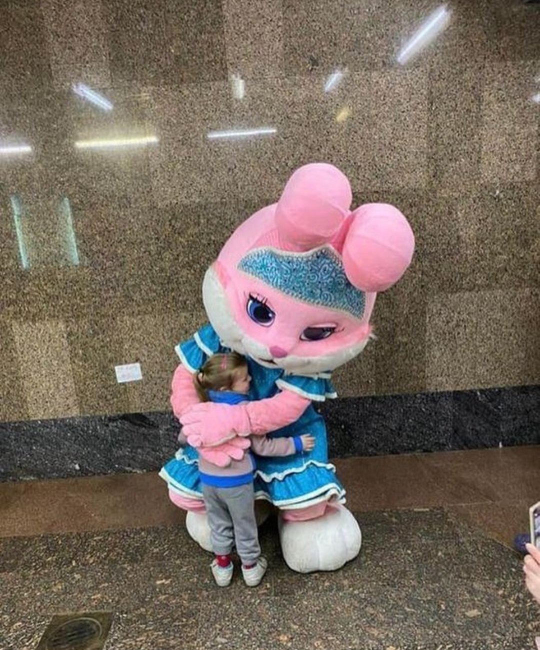 Animators calm children hiding from Russian shelling in Kharkiv metro.