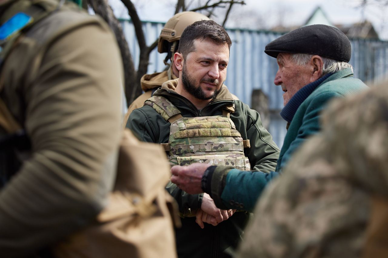 Zelensky visits Bucha, praises resilient residents at aid center