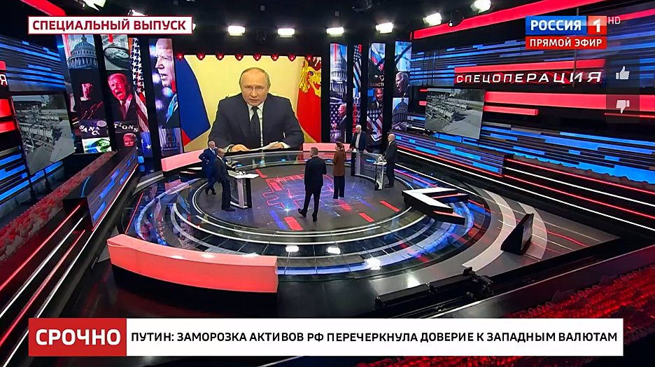Russian state TV denies Ukraine, calls for Russian flags