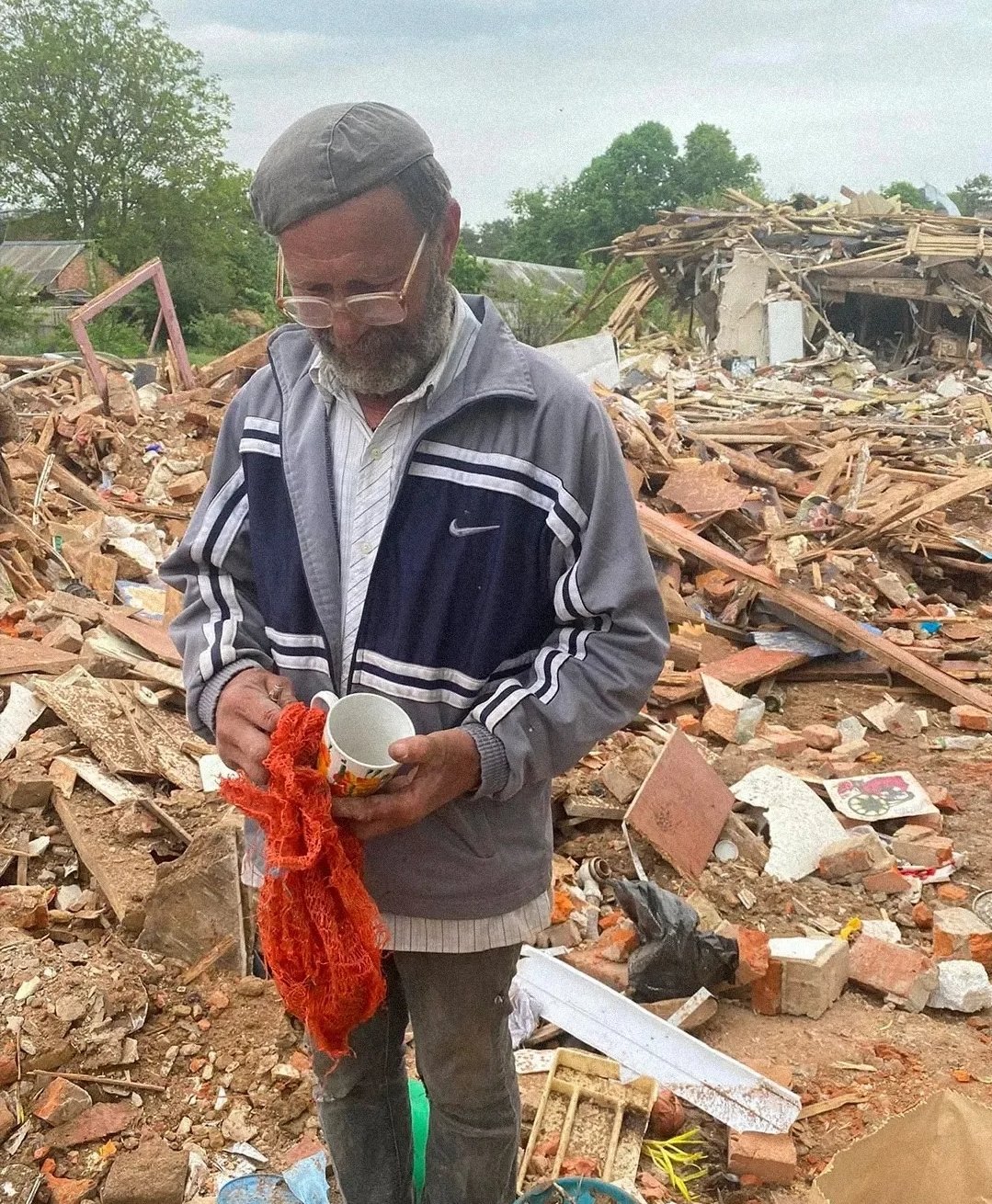 Man finds intact cup in rubble where five loved ones died