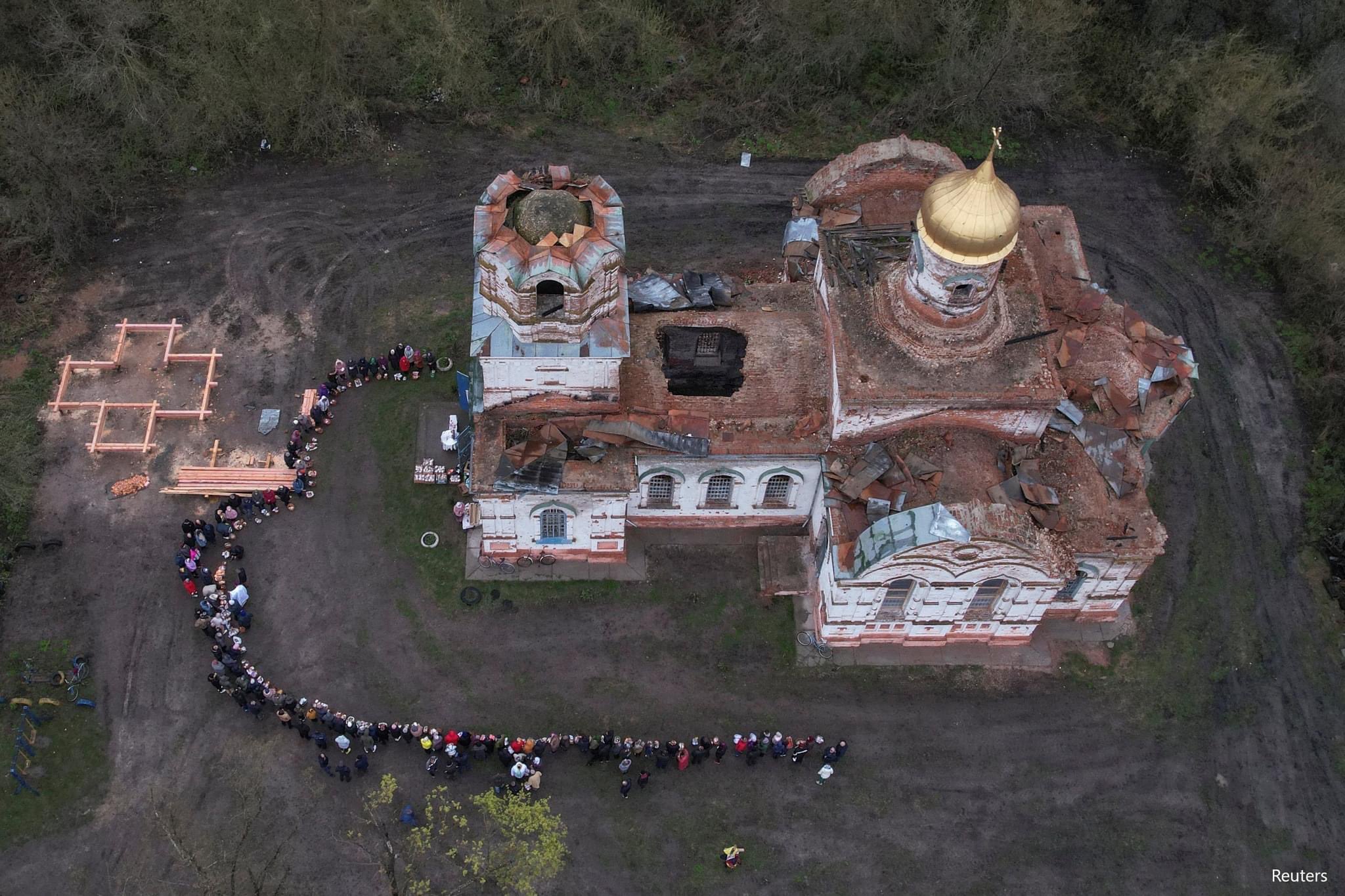 Easter worshippers waiting to sanctify food in war-torn Ukraine