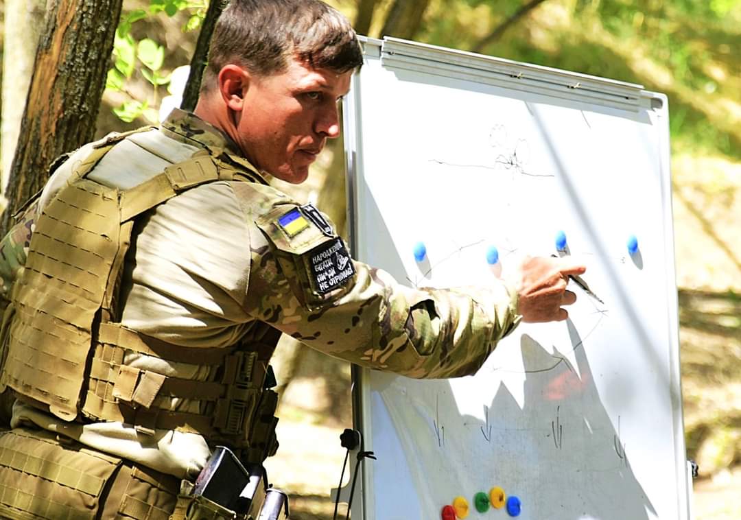 Instructors train troops in vital combat skills
