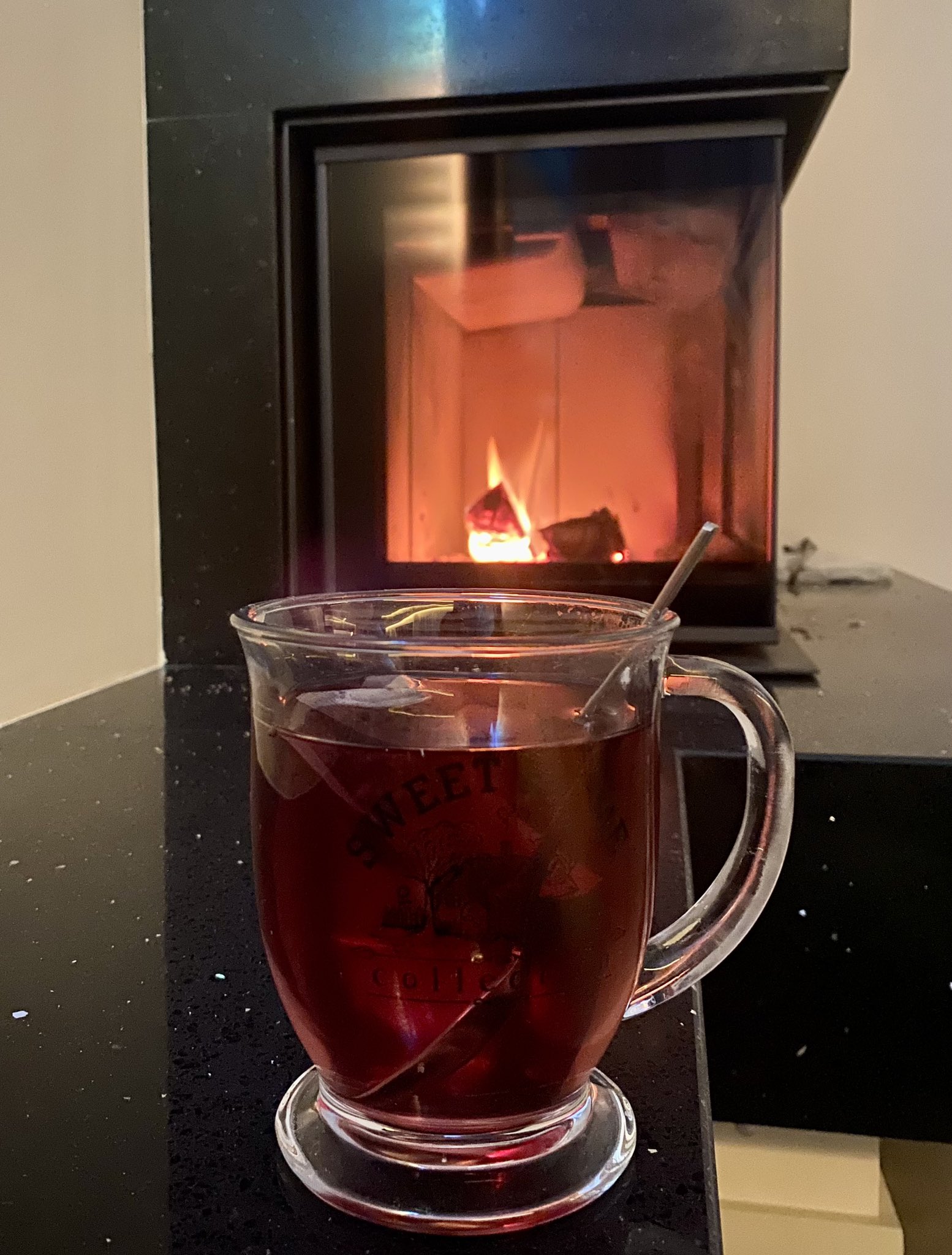 Evening with tea, fireplace, and curfew on Jan 1