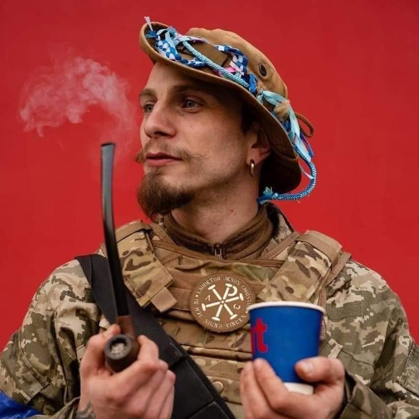 Honoring fallen Ukrainian defenders and international fighters in the Russo-Ukrainian war.