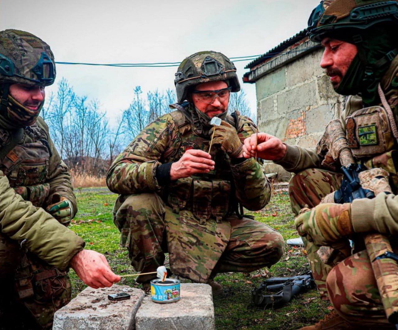 Ukrainian soldiers recreate a birthday tradition for a comrade on the front